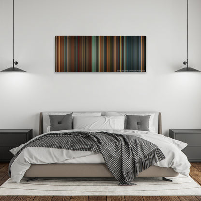 Constantine color palette canvas above a bed, between two black pendant lamps