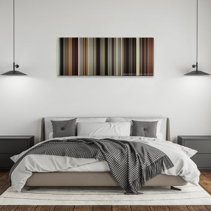 The Wrestler color palette canvas above a bed, between two black pendant lamps