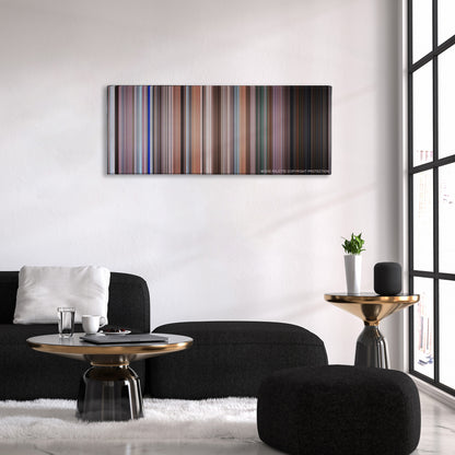 Elf color palette canvas above a black sofa with a gold-topped table