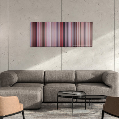 Big color palette canvas on a concrete wall above a gray sectional sofa