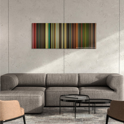 Planet Terror color palette canvas on a concrete wall above a gray sectional sofa