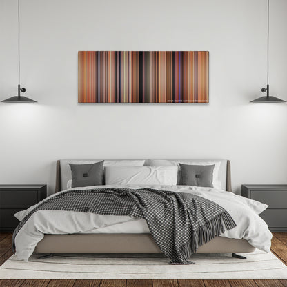 There's Something About Mary color palette canvas above a bed, between two black pendant lamps
