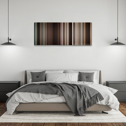 The Book of Eli color palette canvas above a bed, between two black pendant lamps