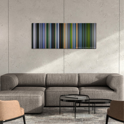 The Experiment color palette canvas on a concrete wall above a gray sectional sofa