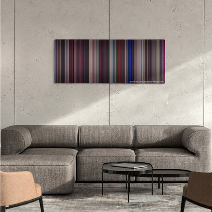 Carlito's Way color palette canvas on a concrete wall above a gray sectional sofa
