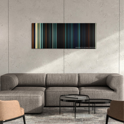 Season of the Witch color palette canvas on a concrete wall above a gray sectional sofa