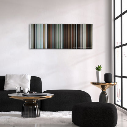 Manchester by the Sea color palette canvas above a black sofa with a gold-topped table
