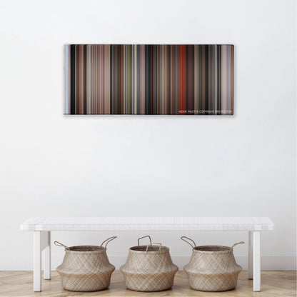 A View to a Kill color palette canvas above a white bench with three woven baskets