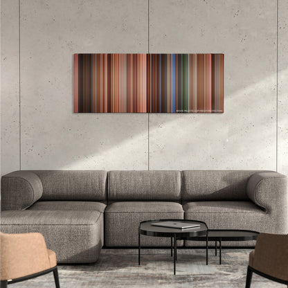 EuroTrip color palette canvas on a concrete wall above a gray sectional sofa