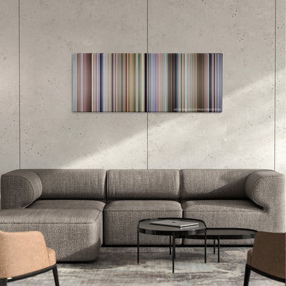 Election color palette canvas on a concrete wall above a gray sectional sofa
