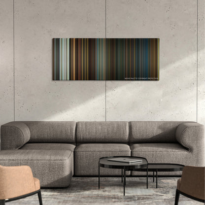 The Purge: Election Year color palette canvas on a concrete wall above a gray sectional sofa