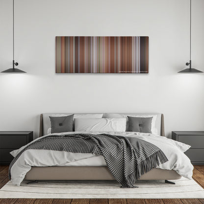 Liar Liar color palette canvas above a bed, between two black pendant lamps