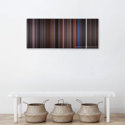 Scrooged color palette canvas above a white bench with three woven baskets
