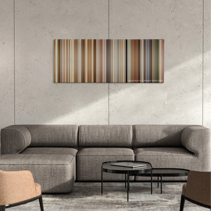 Instant Family color palette canvas on a concrete wall above a gray sectional sofa