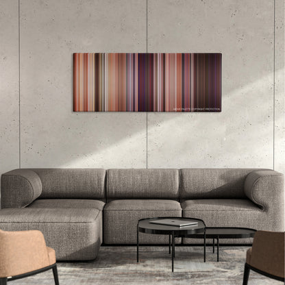 The Hot Chick color palette canvas on a concrete wall above a gray sectional sofa