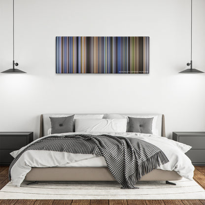Clear and Present Danger color palette canvas above a bed, between two black pendant lamps