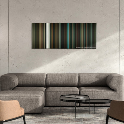 The Number 23 color palette canvas on a concrete wall above a gray sectional sofa