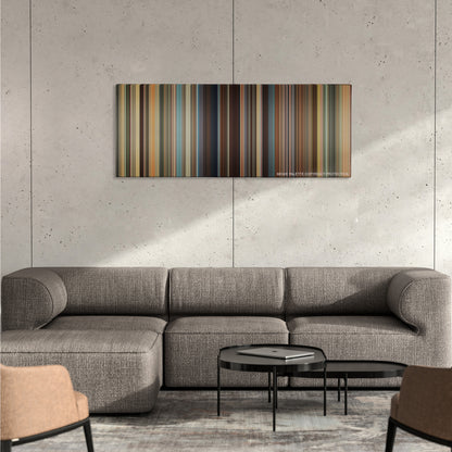 Bad Teacher color palette canvas on a concrete wall above a gray sectional sofa