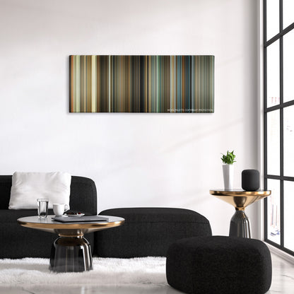 The Box color palette canvas above a black sofa with a gold-topped table