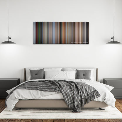 The Living Daylights color palette canvas above a bed, between two black pendant lamps