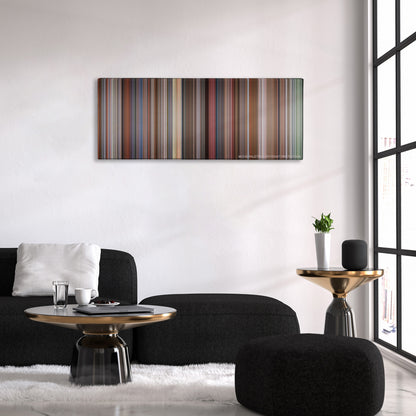 Good Will Hunting color palette canvas above a black sofa with a gold-topped table