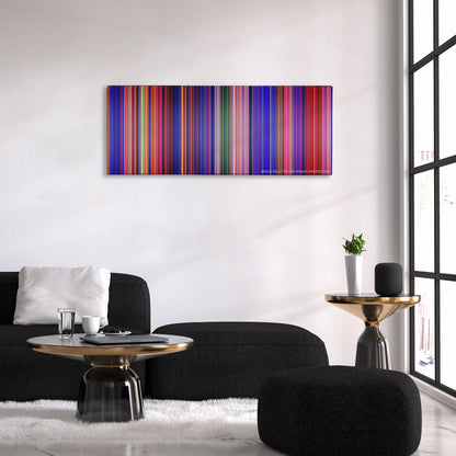 Aladdin color palette canvas above a black sofa with a gold-topped table