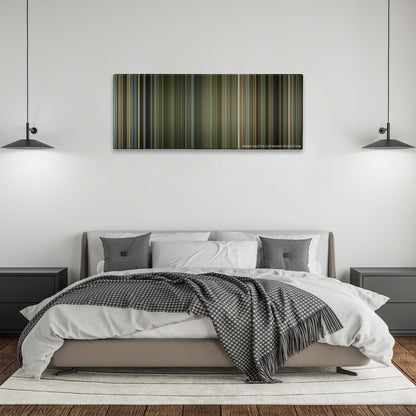 Lone Survivor color palette canvas above a bed, between two black pendant lamps