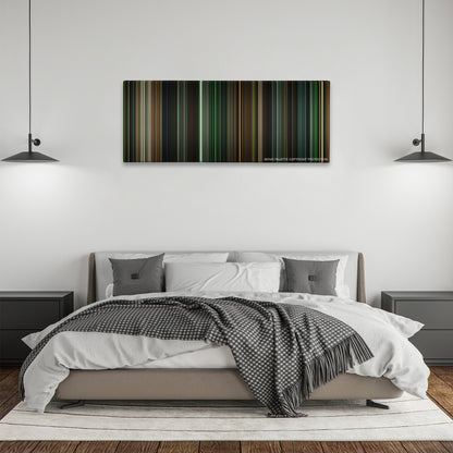 Green Lantern color palette canvas above a bed, between two black pendant lamps