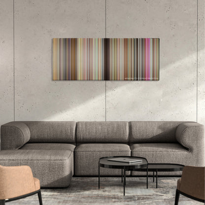 Bad Grandpa color palette canvas on a concrete wall above a gray sectional sofa