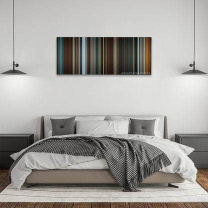 Predestination color palette canvas above a bed, between two black pendant lamps