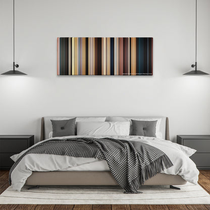 John Carter color palette canvas above a bed, between two black pendant lamps