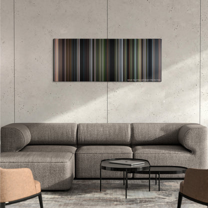 After Earth color palette canvas on a concrete wall above a gray sectional sofa
