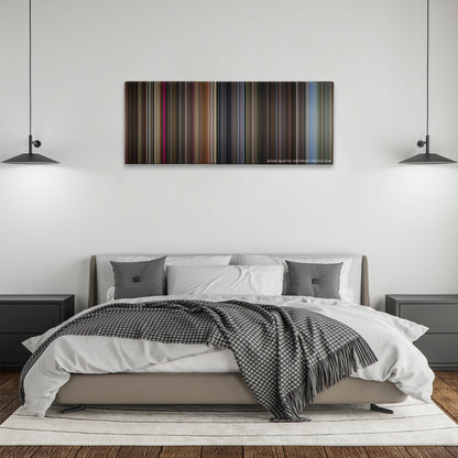 The Gentlemen color palette canvas above a bed, between two black pendant lamps