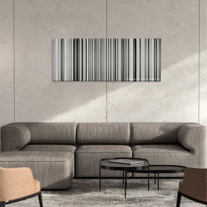 Persepolis color palette canvas on a concrete wall above a gray sectional sofa