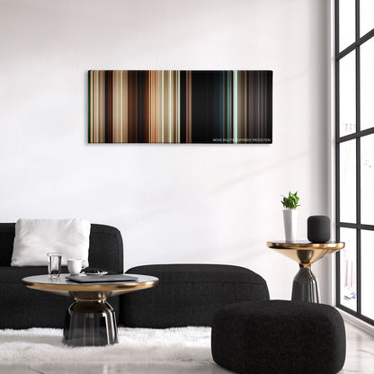 Monsters color palette canvas above a black sofa with a gold-topped table