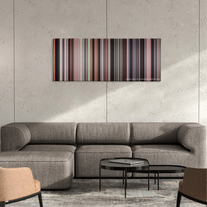 Mississippi Burning color palette canvas on a concrete wall above a gray sectional sofa