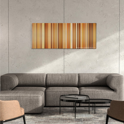 Blue Jasmine color palette canvas on a concrete wall above a gray sectional sofa