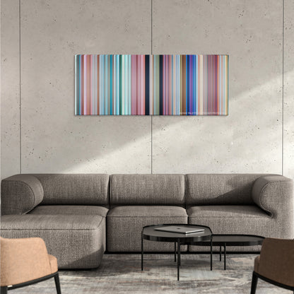 Ice Age: Continental Drift color palette canvas on a concrete wall above a gray sectional sofa