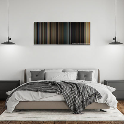 Noah color palette canvas above a bed, between two black pendant lamps