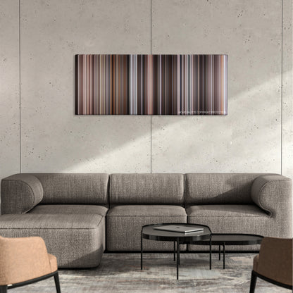Mr. Popper's Penguins color palette canvas on a concrete wall above a gray sectional sofa