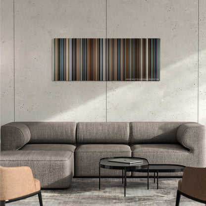 Ocean's Eight color palette canvas on a concrete wall above a gray sectional sofa