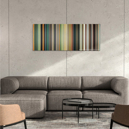 Bolt color palette canvas on a concrete wall above a gray sectional sofa
