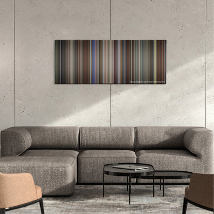 The People vs. Larry Flynt color palette canvas on a concrete wall above a gray sectional sofa