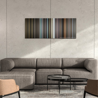 The Death of Stalin color palette canvas on a concrete wall above a gray sectional sofa