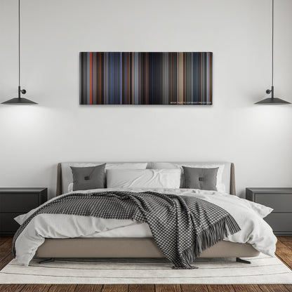 GoldenEye color palette canvas above a bed, between two black pendant lamps