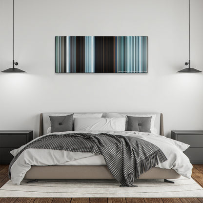 The Grey color palette canvas above a bed, between two black pendant lamps