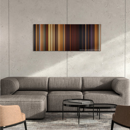 Shrek Forever After color palette canvas on a concrete wall above a gray sectional sofa