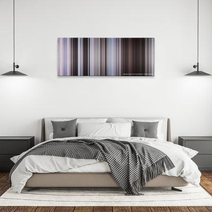 The Magnificent Seven color palette canvas above a bed, between two black pendant lamps