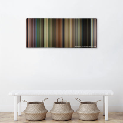 Jumanji: Welcome to the Jungle color palette canvas above a white bench with three woven baskets