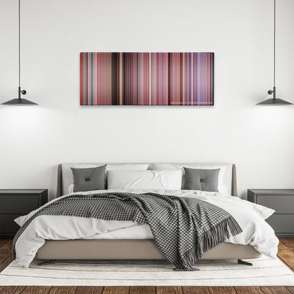 Bring It On color palette canvas above a bed, between two black pendant lamps